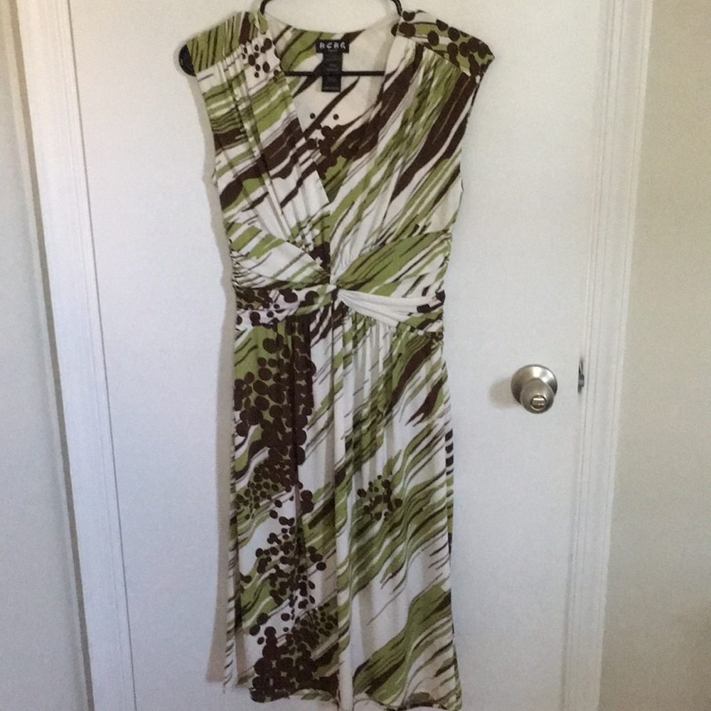 Like new BCBG v-neck dress. Calf length.